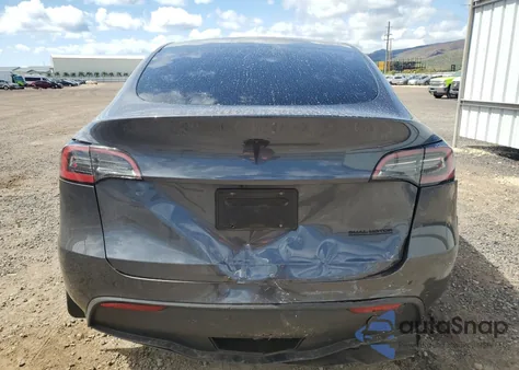 2023 Tesla Model Y from USA, damaged, VIN 7SAYGDEE9PA192444